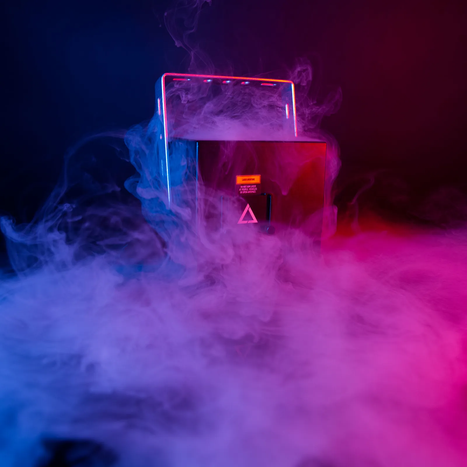 The new lasercube ultra mk2 with purple and blue smoke around it.