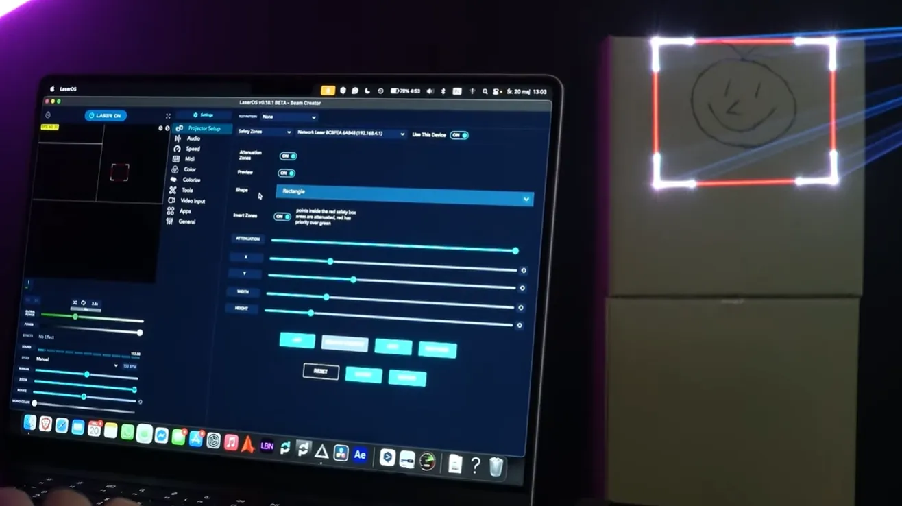LaserOS Safety Zone settings on a laptop, with the zone outline projected onto a box