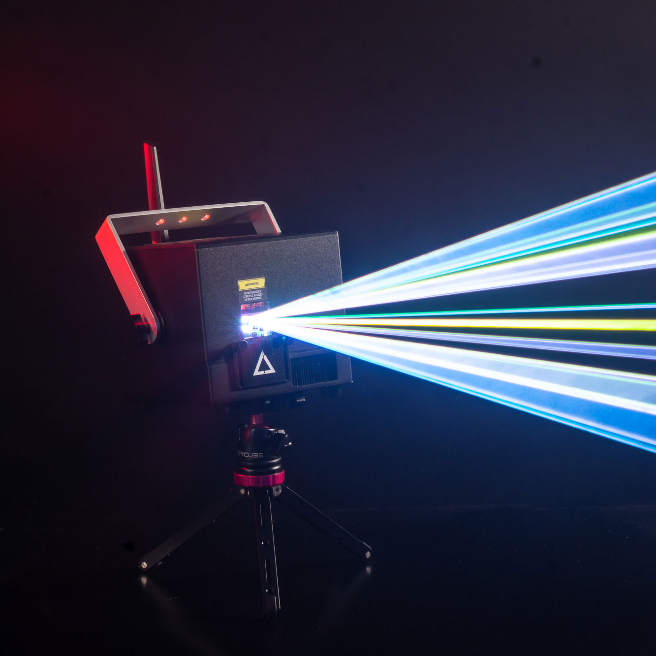 lasercube-10-lg A lasercube laser light projector creating laser lights for a laser show with beams going to the right.